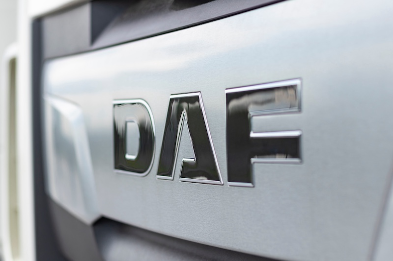 Minsk. Belarus. May 28, 2020. Street lighting. On the truck cab is the inscription Daf. Sun flare. Close up.